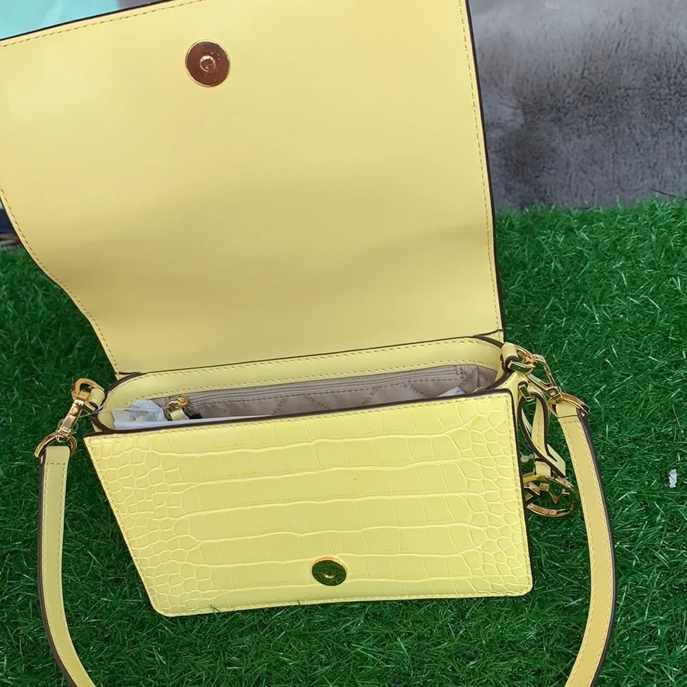 Michael Kors Mercer Sm clutch XBODY Buttercup